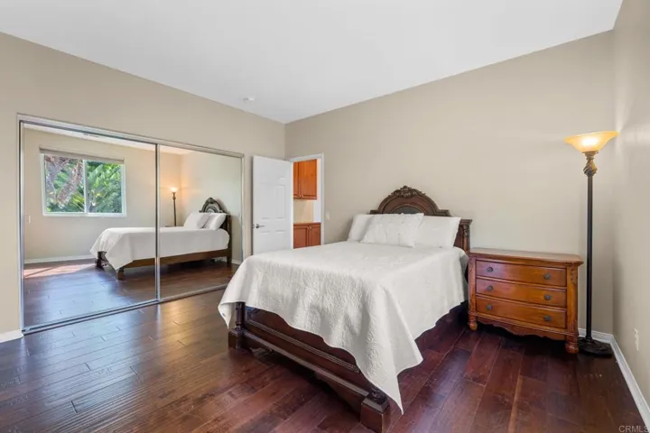 Bedroom with Mirrored Closet Doors