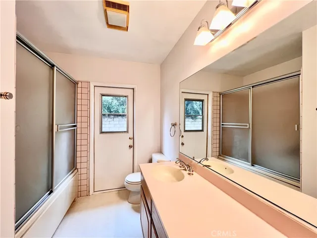 Hall Full Bath w/Exterior Door