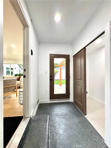 Direct access to laundry and finished out garage with recess lighting and natural light