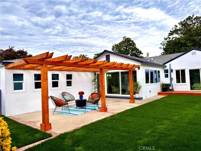 Backyard with Patio off the Family Room & Deck off the Primary Bedroom