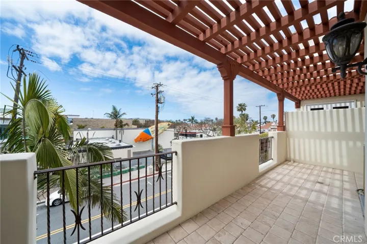 Private Balcony overlooking Olive Ave just two blocks to the beach.