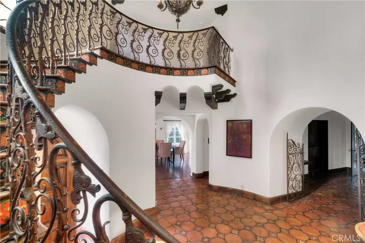 Entry looking into den on the right and dining room on the left.