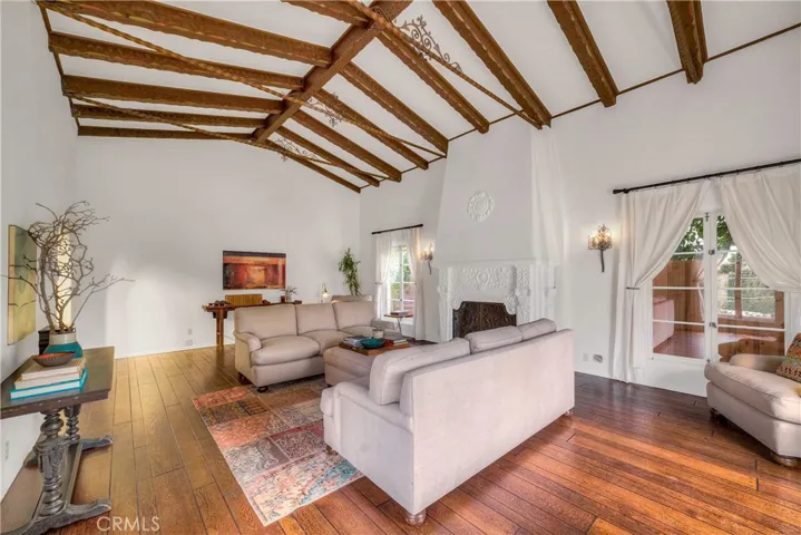Living room with awesome fireplace on right.