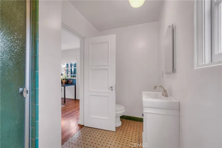 Bath adjacent to bedroom #4.