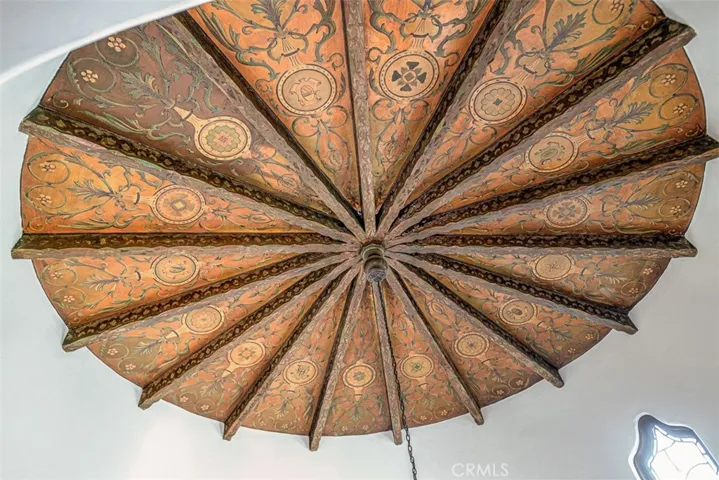 Closeup of wooden detail in 2-story entry.