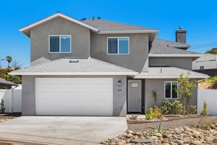Notice the second driveway to the right of the main driveway that leads to where you will park your RV and your boat and this area is away from the main back yard.