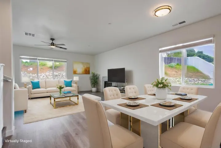 The format of this home as you walk in you will enjoy the great room with dining and a full country kitchen.  All pictures with furnishings are virtually staged simply to show what might be the new owners beautiful home.