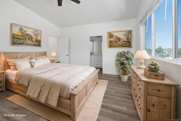 Upstairs primary suite.  With a nice view.  All the upstairs bedrooms have a nice view.  All pictures with furnishings are virtually staged simply to show what might be the new owners beautiful home.