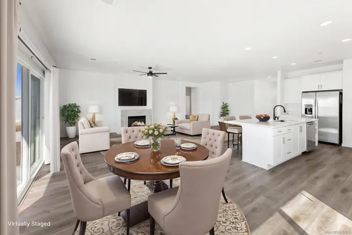 Interchangeable the term Great Room and Living Room.  Just the place for everyone to enjoy.  All pictures with furnishings are virtually staged simply to show what might be the new owners beautiful home.
