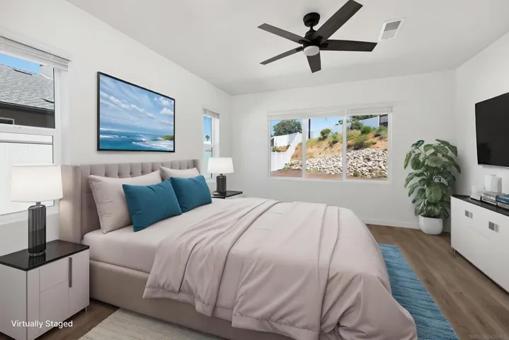 This home has two bedrooms with its own bathroom and walk in closet.  It has 2 primary suites.  And there is another 1/2 bath on the main floor too.  All pictures with furnishings are virtually staged simply to show what might be the new owners beautiful