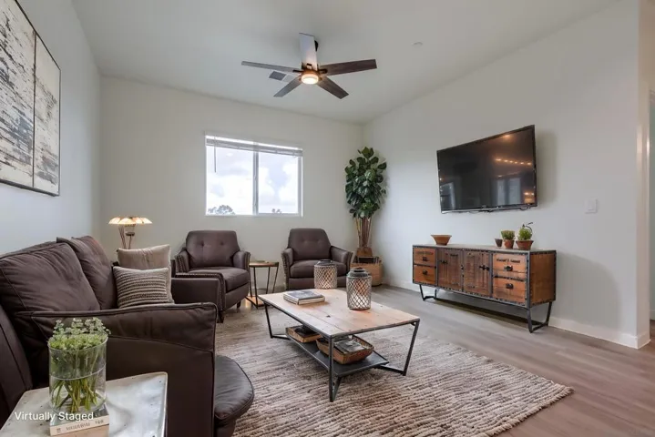 Call it a family room or a loft.  Either way it is a place where the family can get together.  And lots of room for toys and whatever.  All pictures with furnishings are virtually staged simply to show what might be the new owners beautiful home.