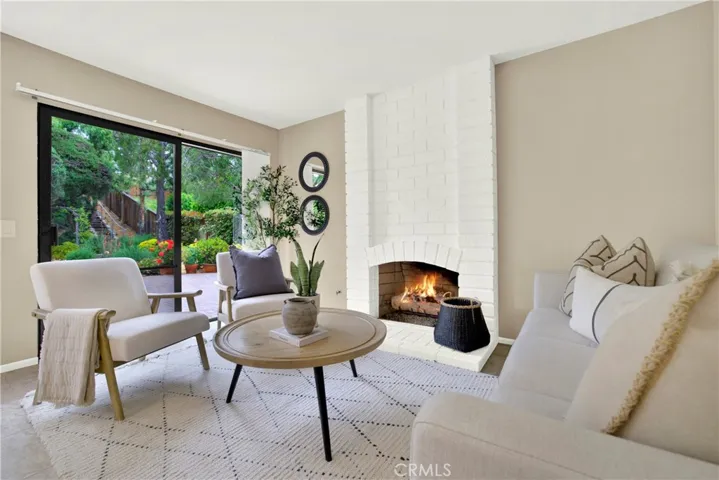 Cozy 2nd living area- open to kitchen and view of the yard.