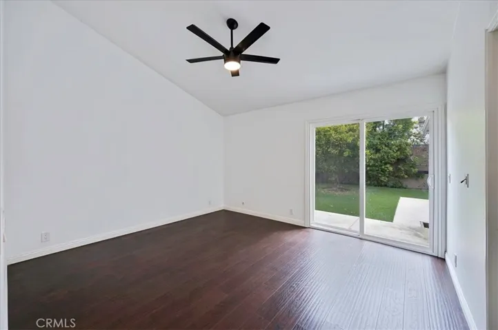 Master bedroom with slider to backyard
