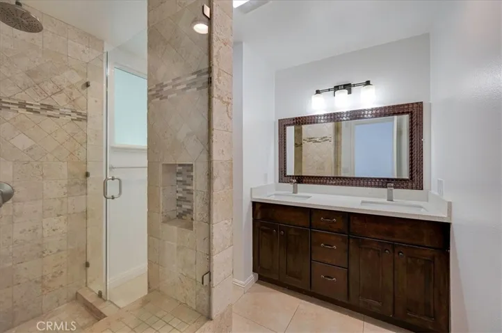 Beautiful granite tiled walk-in shower. Double sinks in en-suite.