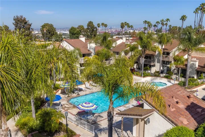 HOA pool with jacuzzi and bathroom/changing room