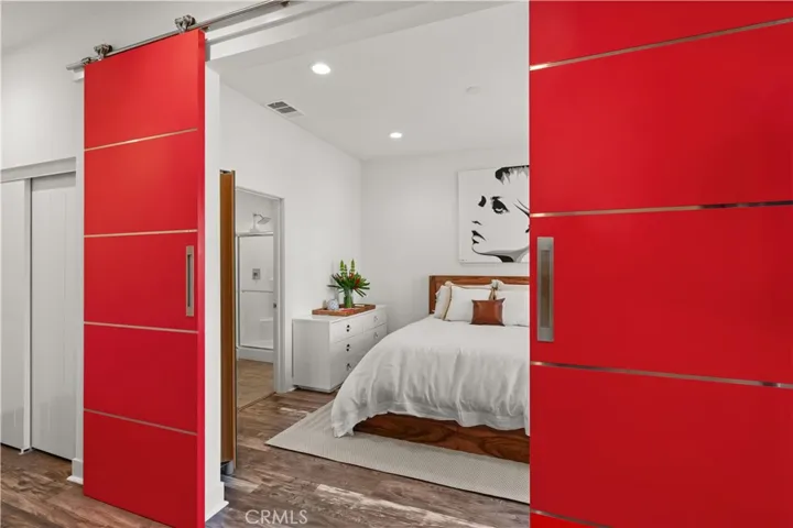 First level barn doors are red. They can be painted any color. We photoshopped white to show a different style.