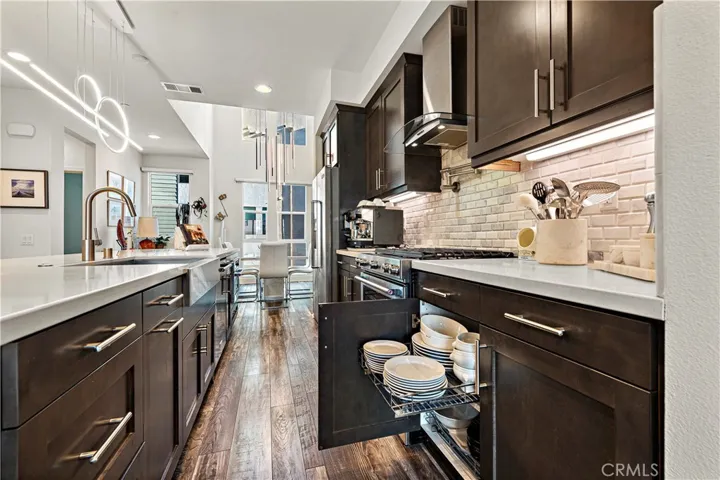 Custom pull out storage throughout the kitchen