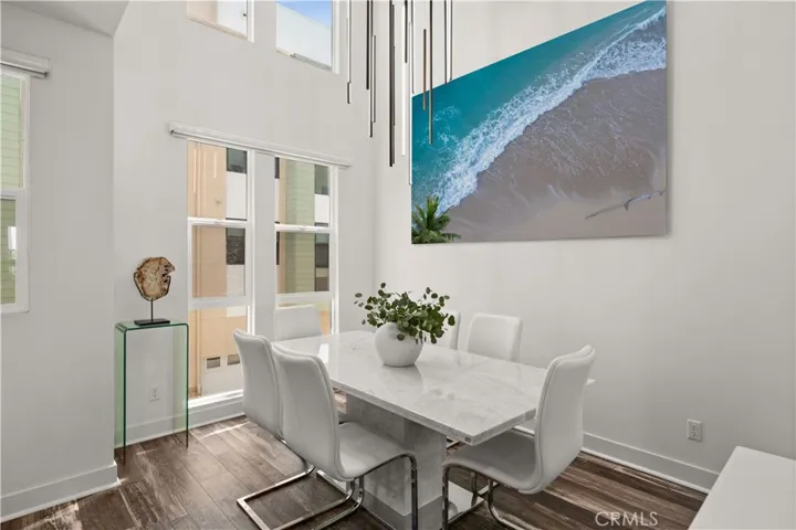 Two-story ceilings, custom blinds throughout