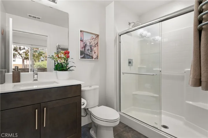 First level walk-in shower, en suite, towel warmers