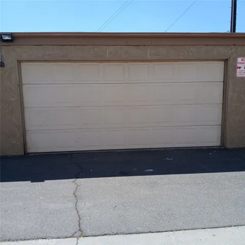 Detached two-car garage with roll-up door