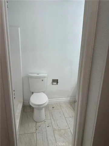 Primary bathroom - new tile, re-glazed shower and countertop, new faucet