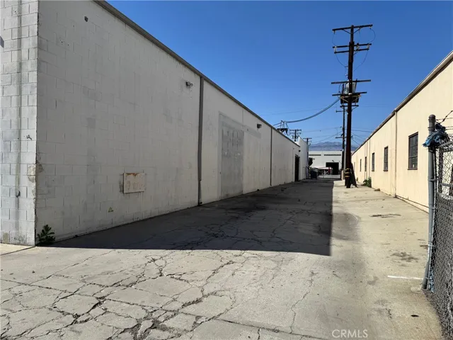 long drive way with ground-level door