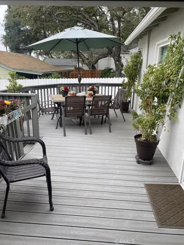 Walking out to our back deck, which we have enjoyed very much..It also has view of our backyard and surrounding trees