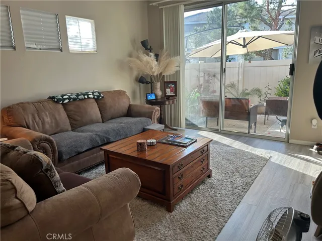 Generous living space with sliding doors to patio