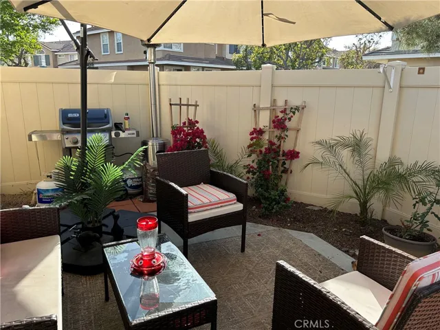 Delightful front patio with privacy vinyl fencing