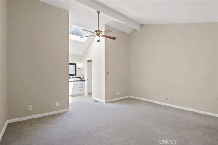 Spacious bedroom, walk-in closet and bathroom with walk-in shower.