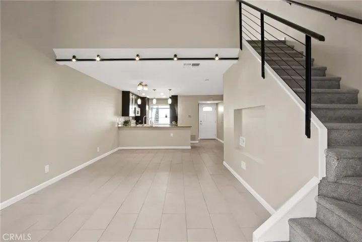 Stairway up to bedroom and bath.