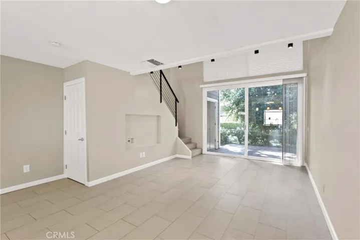 Huge storage closet, nicely tiled flooring, new sliding glass door.