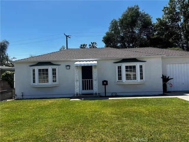 Front yard with sprinklers