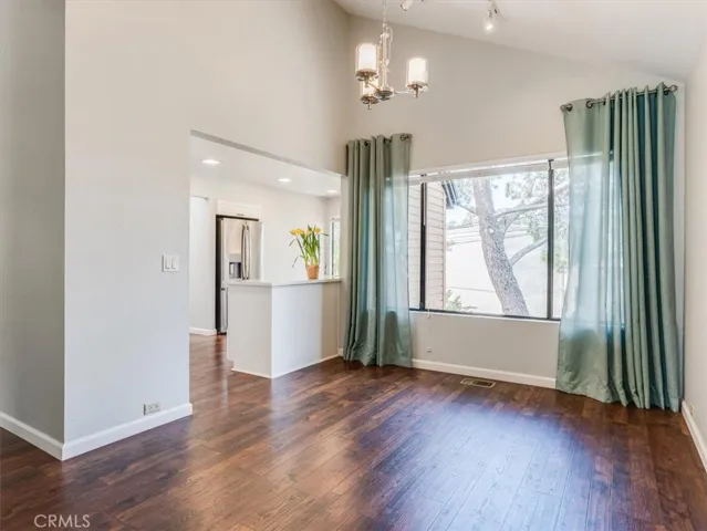 Dining area open to the kitchen and the living room.