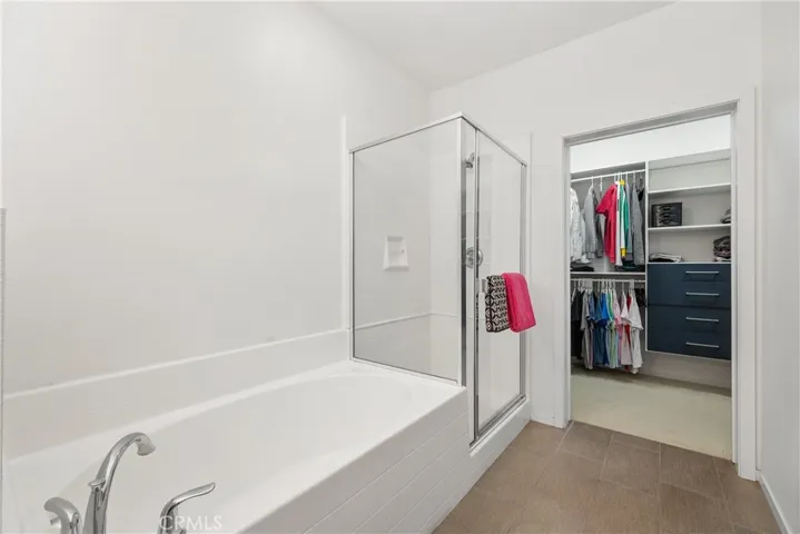 bath to spacious walk-in closet
