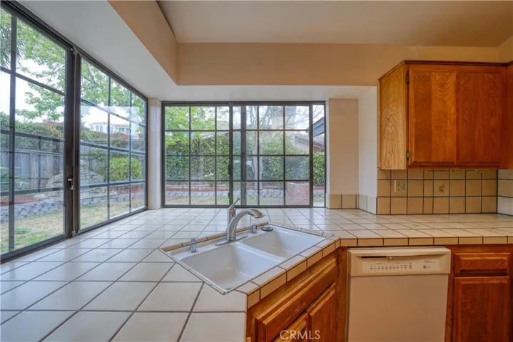 Windows overlooking the expansive back yard