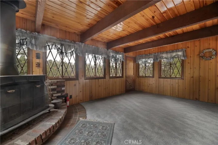 Warmth, Wood & Windows to the Pines
