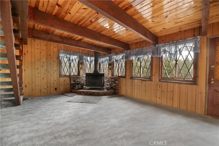 The open-concept living and dining area flows effortlessly, perfect for gatherings or quiet moments.