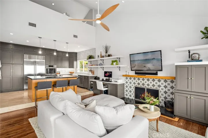 Boasting a bright, open floor plan, the two-story home spans approximately 2,610 square feet and features four generously sized bedrooms and two and a half bathrooms, including a main-level primary suite, this home offers the convenience and comfort of single-level living.