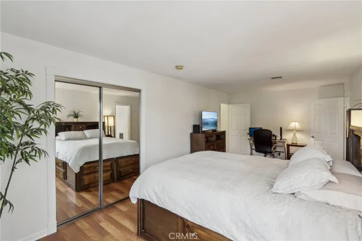 Primary Bedroom Walk-in Mirrored Closet