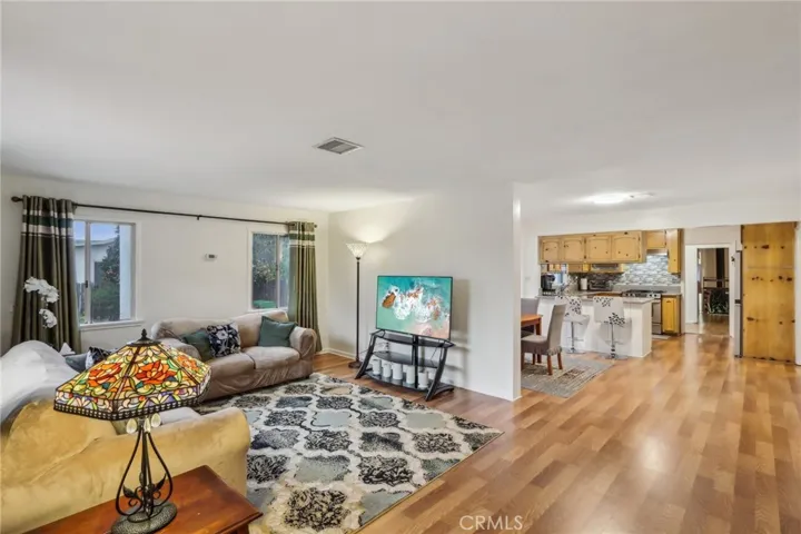 Living Room with view of Dining Room & Kitchen