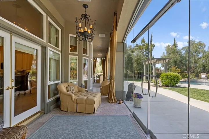 Custom sun room with commercial grade glass doors