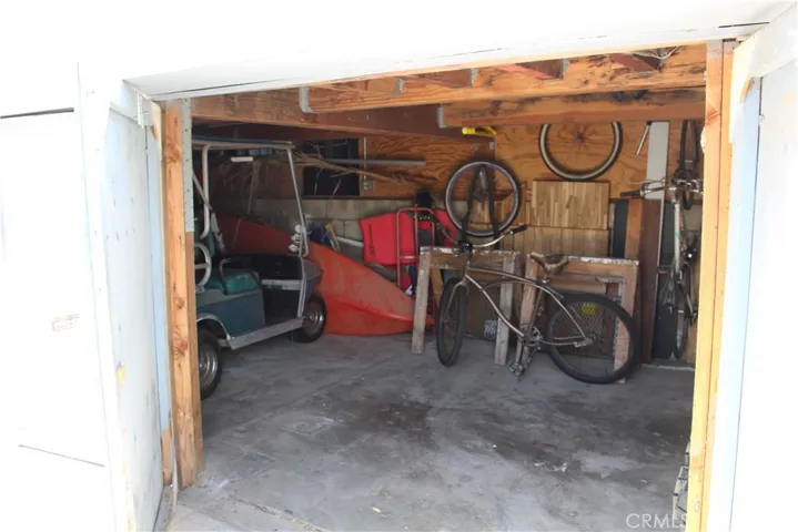 Small golf cart garage with workspace