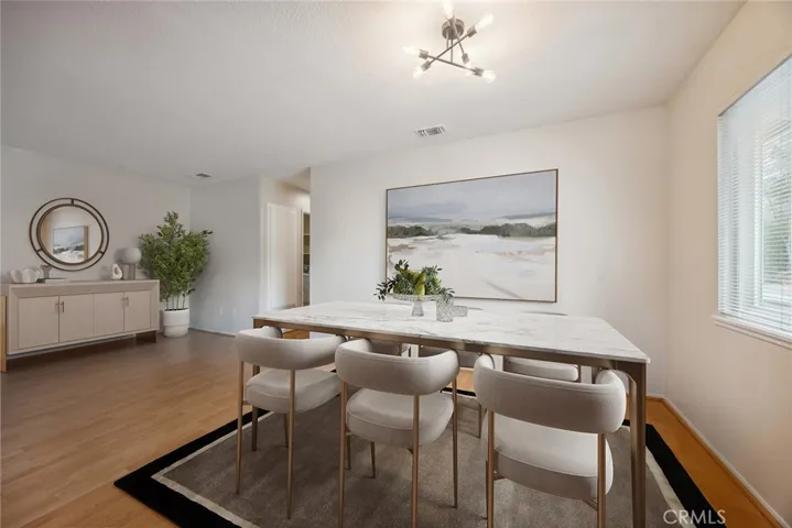 Anohter view of dining room.Virtually Staged