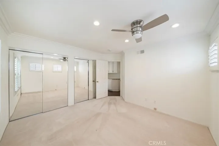 bedroom 2 mirrored closet doors