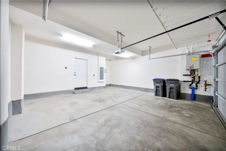 Spacious 2-car garage, tankless water heater, and EV charger ready