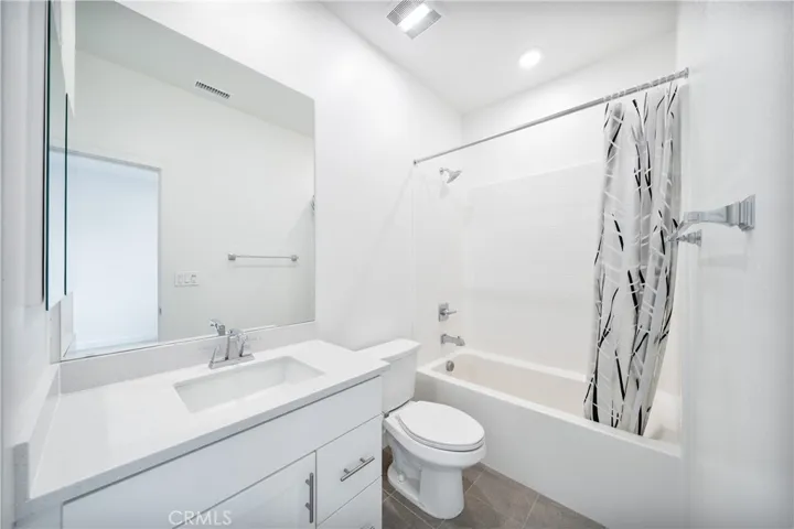 Upstairs secondary bathroom with tub/shower combo.