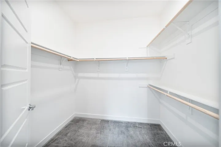 Upstairs Primary bedroom large walk-in closet.
