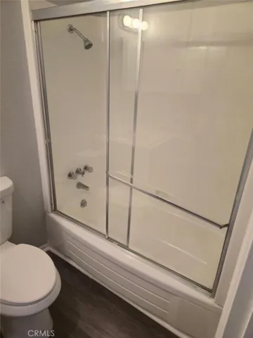Secondary bathroom offers a shower over the tub
