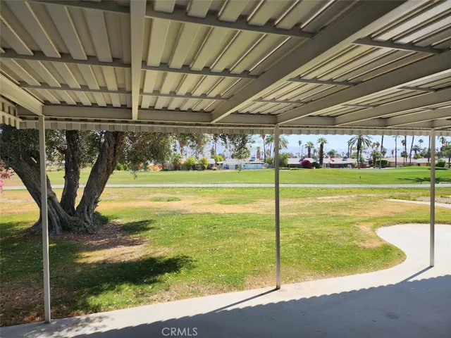 Inviting oversized patio with cover provides space for all of your enteraining